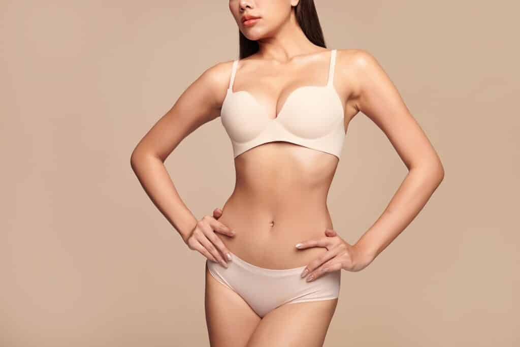 A cropped shot of a woman's torso after getting the O-shot in Melville, NY