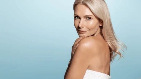 mature-old-lady-beautiful-glowing-260nw-2289816393 A woman looking over her shoulder after laser skin resurfacing in Nassau County, NY